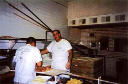 Gary Bimonte creating a Pepe's pizza.