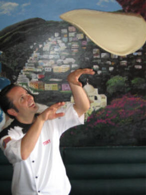 Tony Gemignani shows the art of the toss..